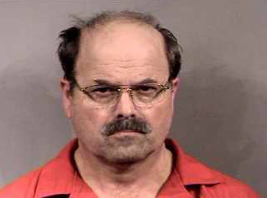 Dennis Rader, a.k.a. the BTK Killer, following his arrest in Sedgwick County, Kansas. February 27, 2005.